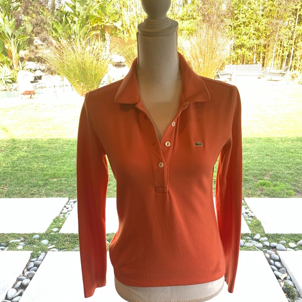 This is a long sleeve polo shirt from Lacoste
